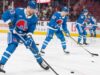 Batalha de Quebec acena enquanto o Avalanche usa camisetas do Nordiques em Montreal