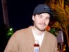 Brooklyn Beckham cobre os braços enquanto promove sua linha de molhos picantes em um pageant gastronômico – depois de ser flagrado usando um relógio de £ 220 mil presenteado por seu pai David
