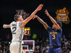 Honor Huff, West Virginia ultrapassa UCF