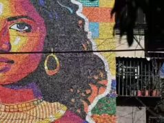 Mona Lisa de El Salvador recebe uma reforma colorida em um mural de 13 metros feito de bonés reciclados