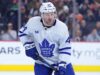 Rielly do Maple Leafs sai contra Canucks com lesão na parte superior do corpo